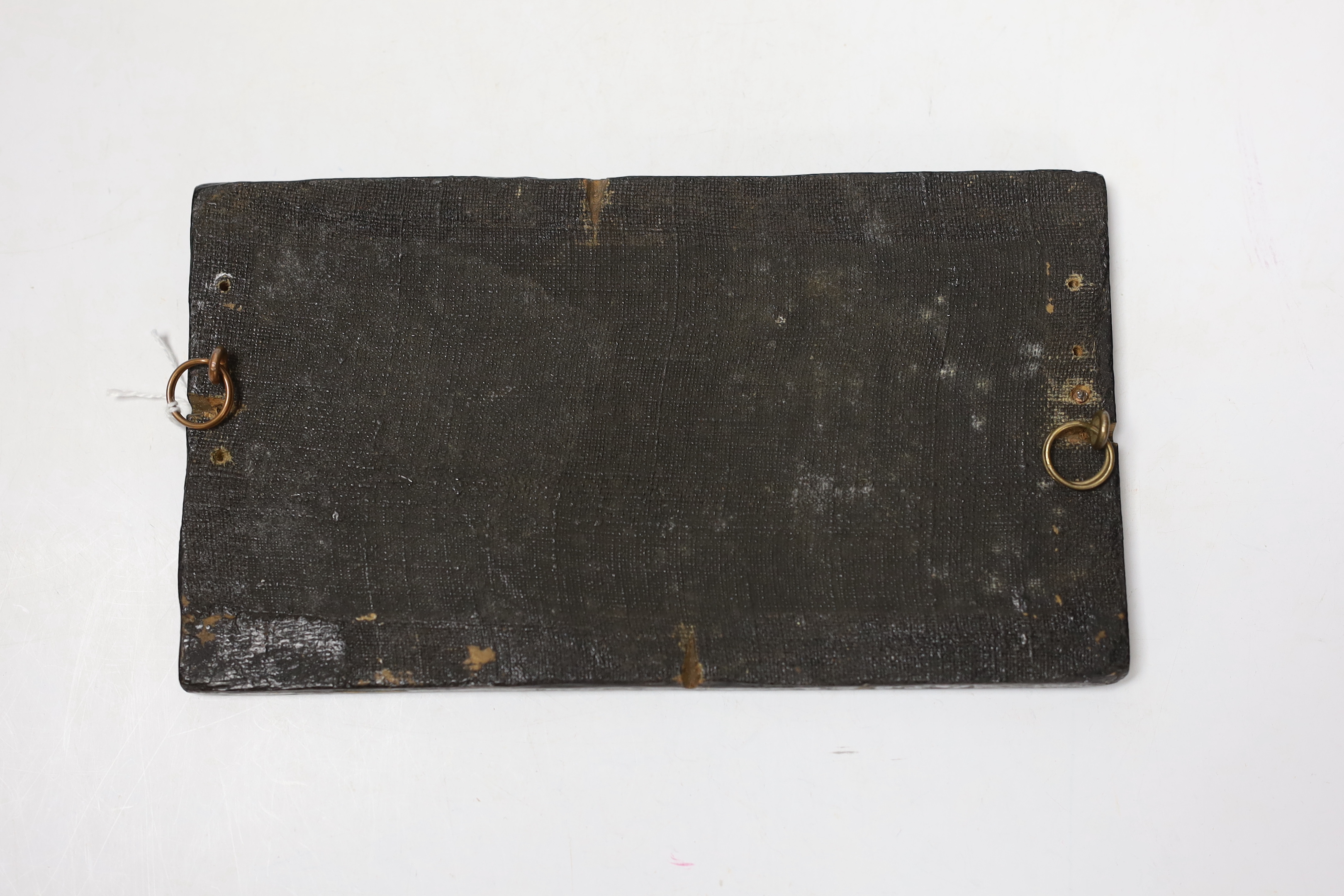 A 19th century painted and carved wood armorial coach panel, 12 x 21cm